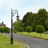 Antique Brown Cast Iron Ornate Swan Neck Lamp Post On Period Driveway Antique Brown Cast Iron Ornate Swan Neck Lamp Post On Period Driveway