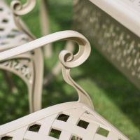 Close-up of the Antique Champagne Scroll Arm on the Chair