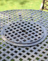 Close-Up of Circular Table with Grill Close-Up of Circular Table with Grill