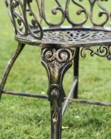 Close-Up of Ornate Pattern on Chair Legs Close-Up of Ornate Pattern on Chair Legs