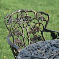 Close-Up of Design and Antique Gold Finish on Four Seater Dining Set Close-Up of Design and Antique Gold Finish on Four Seater Dining Set