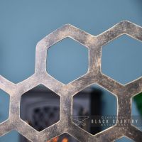 Close-up of the Antique Gold Honey Come Design