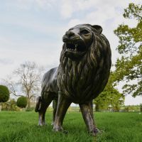 Antique Gold Lion Sculpture in the Garden