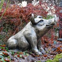 Side View of the Antique Gold Sitting Pig Sculpture Side View of the Antique Gold Sitting Pig Sculpture