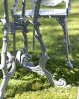 Close-Up of Integral Leg Supports for Antique Grey "Versailles" Four Seater Dining Set