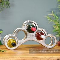 Antique Nickel Arched Wine Rack Holding Wine Bottles