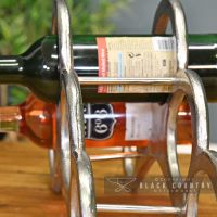 Side View of the Wine Bottles Sitting on the Wine Rack