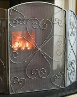 Close-Up of Antique Pewter Heart Design Three Fold Fireguard