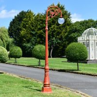 Antique Red Ornate Cast Iron Globe Lamp Post In Garden