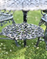 Close-Up of Footrest on Table for Two-Seater Bistro Set