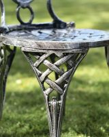 Close-up of Table Leg Design on Antique Silver "Valhalla" Two Seater Bistro Set