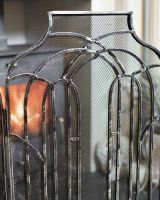 Close-Up of Antique Silver Arched Three Fold Fire Guard Close-Up of Antique Silver Arched Three Fold Fire Guard