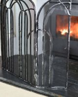 Close-Up of Antique Silver Arched Three Fold Fire Guard in SItu Close-Up of Antique Silver Arched Three Fold Fire Guard in SItu