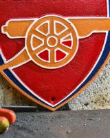 Close up of "Arsenal" Cast Iron Reproduction Sign finish