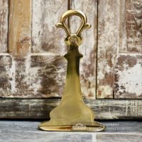 Back of Polished brass door stop