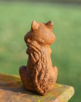 Back view of rustic cast iron garden ornament Back view of rustic cast iron garden ornament