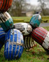 ‘Tangle’ the Balloon Dog Upcycled Oil Drum Garden Sculpture close up of body and legs of sculpture