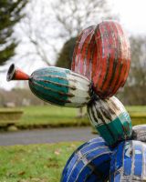 ‘Tangle’ the Balloon Dog Upcycled Oil Drum Garden Sculpture close up of head