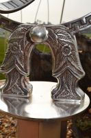 Close-up of the Detail on the Antique Silver Armillary with Column