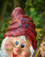 Bass playing gnome Hat close up Bass playing gnome Hat close up
