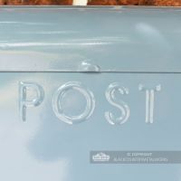 Embossed mail box with word POST
