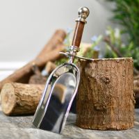 bright chrome dust pan for fireside cleaning