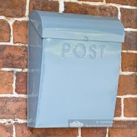Light Pastel blue wall mounted post box with curved lid