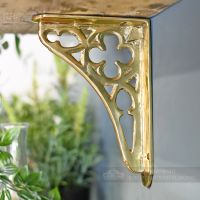 Side view of solid brass coalbrookdale shelf bracket