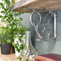Interior design chrome bird shelf bracket