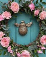 bcmw_-_dk356_-_a_-_antique_brass_bumblebee_door_knocker_-_ green door with flowers