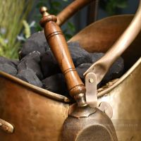 Close up of hardwood handle on shovel Close up of hardwood handle on shovel