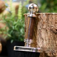 Fireside brush, close up of hardwood handle with ball finial