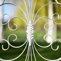Close up of wrought iron pattern on handrails