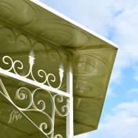 Garden pavillion - ornate scroll work on underside of roof Garden pavillion - ornate scroll work on underside of roof