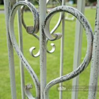 Heart shaped scroll metalwork on gazebo