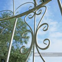Ornate detailing on side panels of landscape garden gazebo Ornate detailing on side panels of landscape garden gazebo