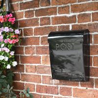 Minimalist black wall mounted letter box