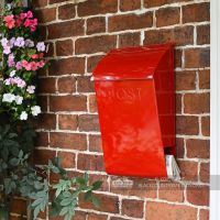 Robust wall mounted mail box with added newspaper holder Robust wall mounted mail box with added newspaper holder