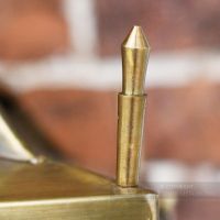 Detailed image of corner finial on brass lantern Detailed image of corner finial on brass lantern