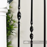 Detailed image of black stair spindle