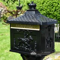 Black ornate secure post box with brushed gold letter flap Black ornate secure post box with brushed gold letter flap