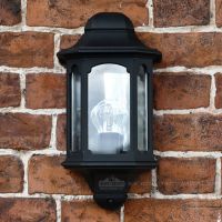 Exterior wall lantern finished in black