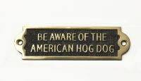 Brass "Be Aware of the American Hog Dog" Sign