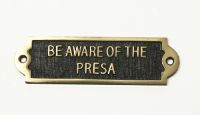 Brass "Be Aware of the Presa" Sign