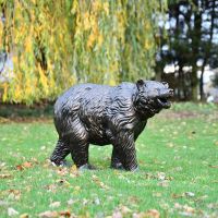 Bear Cub Antique Bronze Garden Sculpture in Situ in the Garden Bear Cub Antique Bronze Garden Sculpture in Situ in the Garden