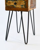 Close up of recycled iron legs detail on side cabinet
