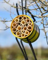 Close up of insect hotel detail on recycled metal art sculpture