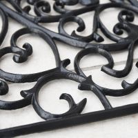 Close-up of the Ornate Design on the Doormat