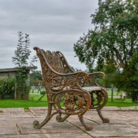Side view of Rustic "Serpent" Gothic Garden Bench