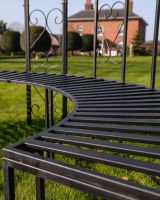 "Kensington" Domed Wrought Iron Gazebo in a Midnight Black Finish Close up of Curved Seating